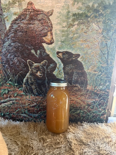 A jar of raw honey, packed and ready